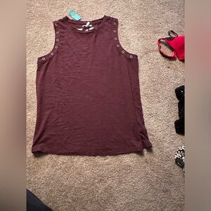 Maurice’s tank top size XS NWT fits more like a small or medium IMO